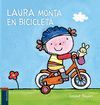 LAURA MONTA EN BICICLETA